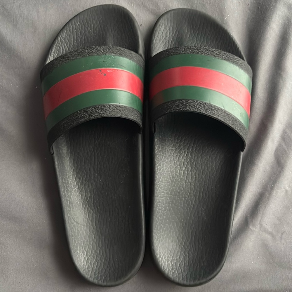 Slightly worn Gucci slides